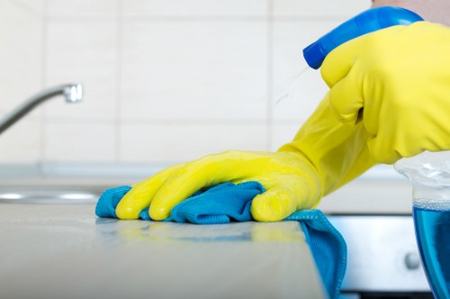 Local cleaning team maintaining a Barnes business entrance