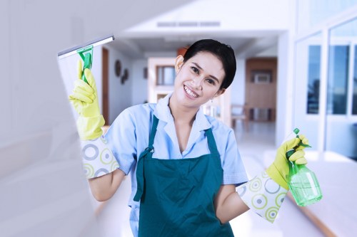 Local carpet cleaner treating stains in a Barnes home hallway